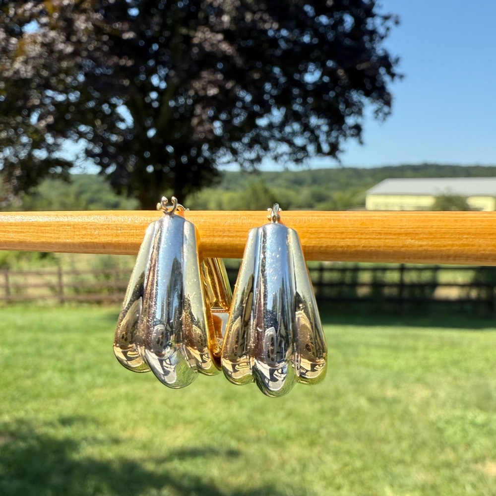 14k stamped vintage puffy two toned yellow and white gold earrings.